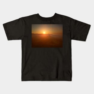 Aerial view of sunset over mountain jungle Kids T-Shirt